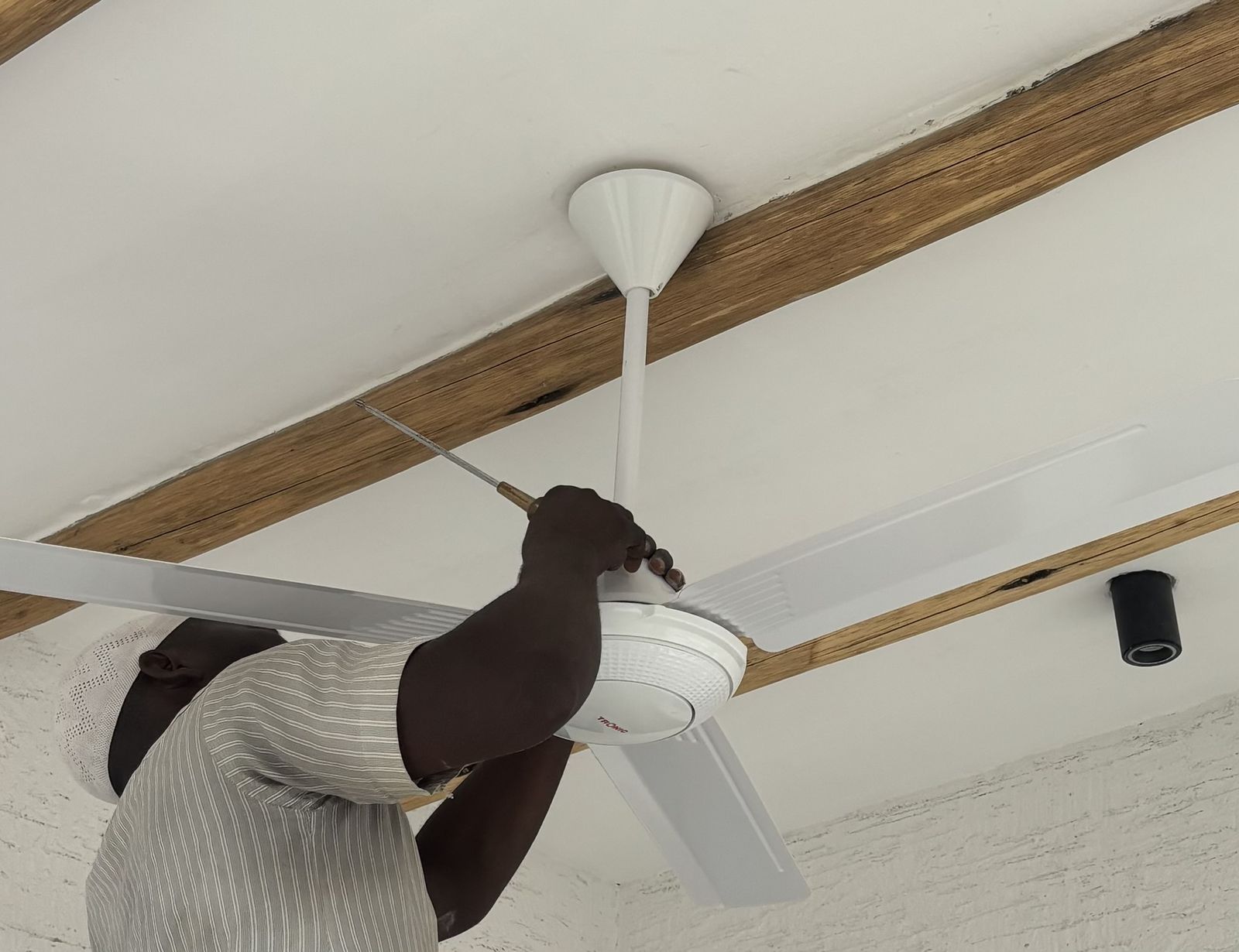 Timber beams on the ceiling, fitted by hand