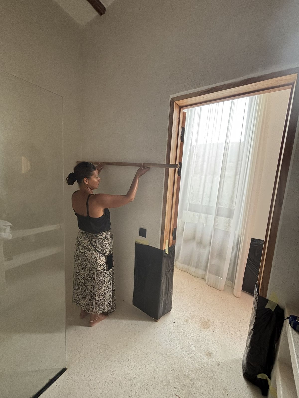 Laetitia checking a bathroom, May 2026