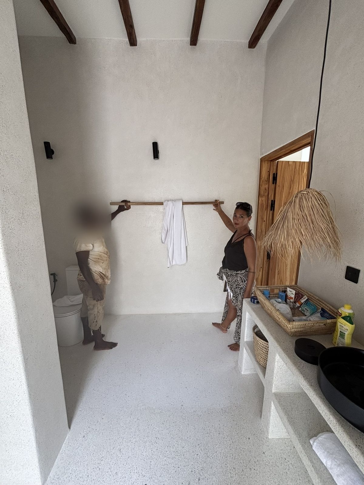 Finishing touches in a bathroom, May 2026