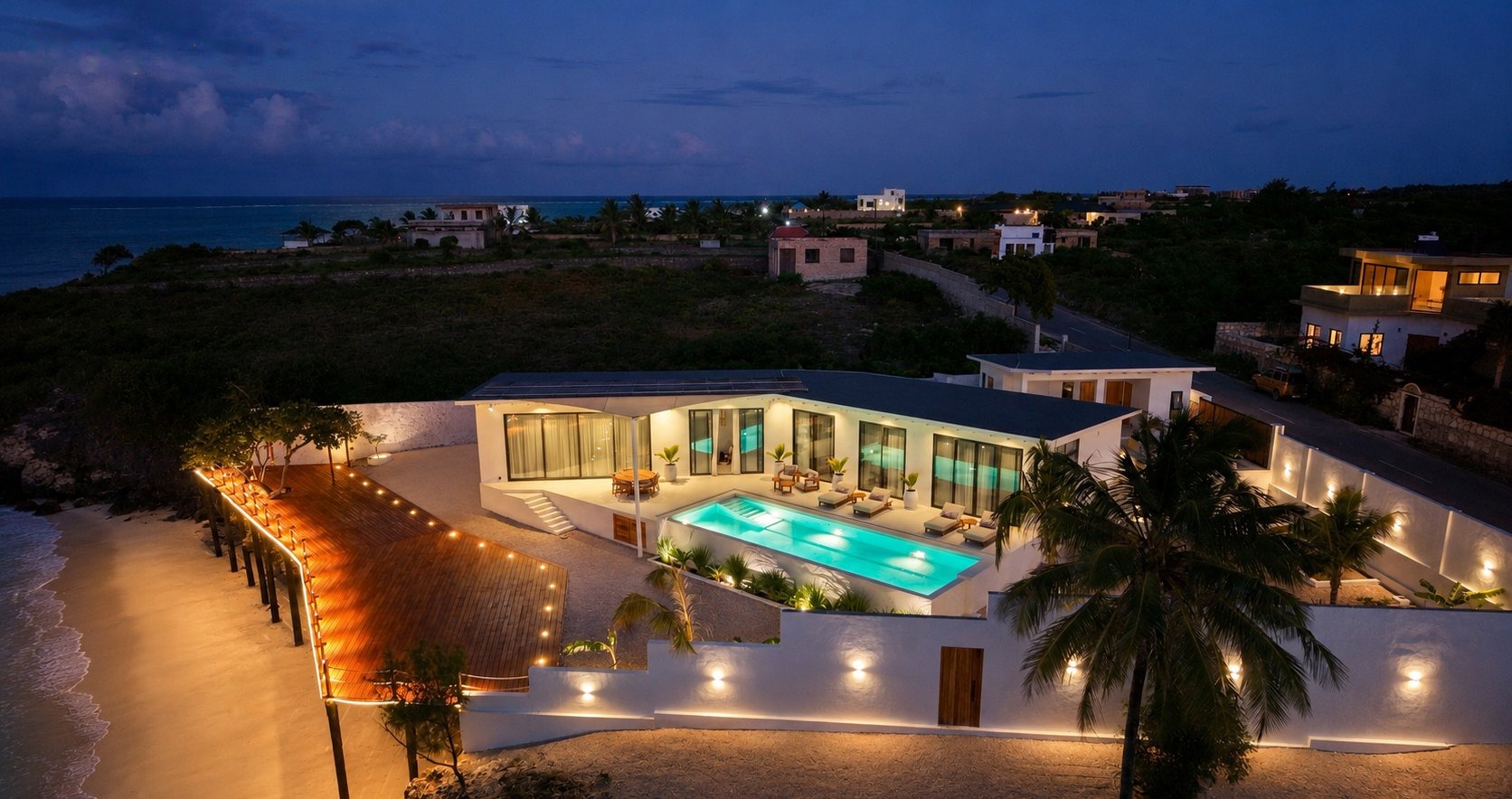 Infinity pool at night at Zuri Cliff villa
